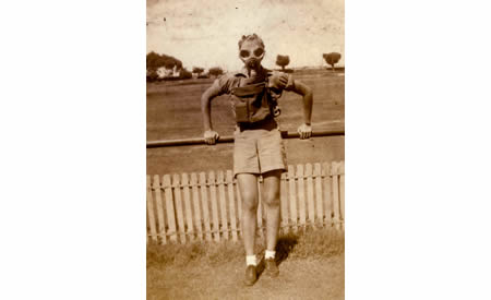 Unidentified AWAS member in a gas mask, Northam Camp, 1942. Courtesy Elsie Solly