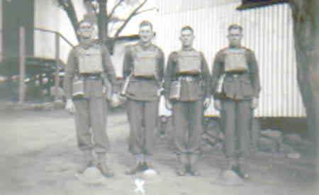 Ray Reynolds, Ted Brindle, Tom Doherty and Snooks Adams in their drill packs, Northam Camp, 1941. Tom Doherty and Snooks Adams were killed in action. Courtesy Ted Brindle